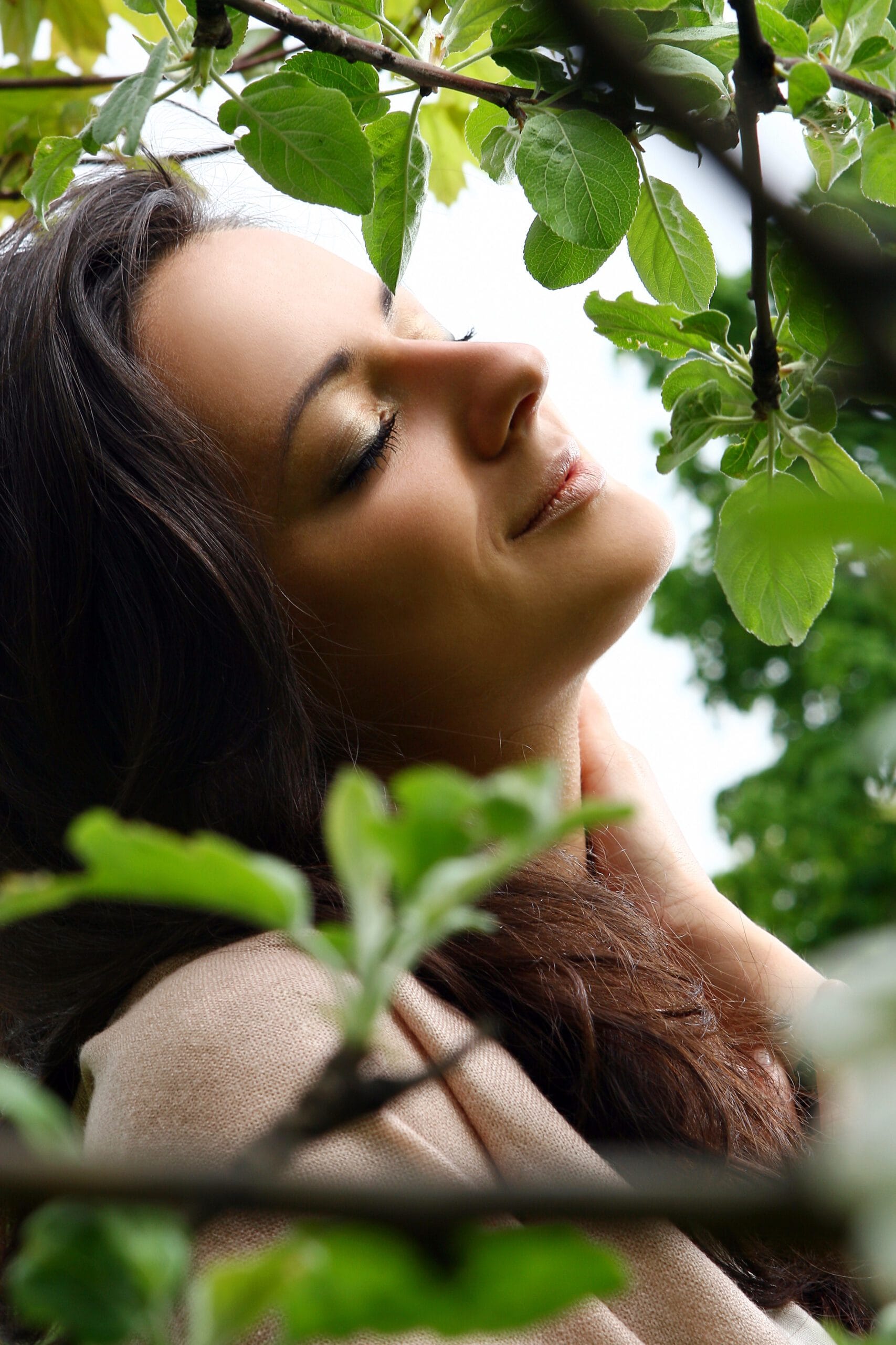 beautiful woman standing by blossoming tree green park scaled 1